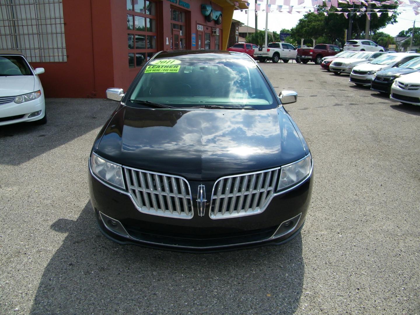 2011 Black /Black Lincoln MKZ FWD (3LNHL2GC0BR) with an 3.5L V6 DOHC 24V engine, 6-Speed Automatic transmission, located at 4000 Bee Ridge Road, Sarasota, FL, 34233, (941) 926-0300, 27.298664, -82.489151 - Photo#1